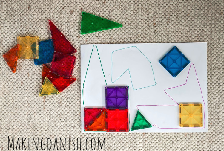 Tangram puzzle match with magnetic tiles